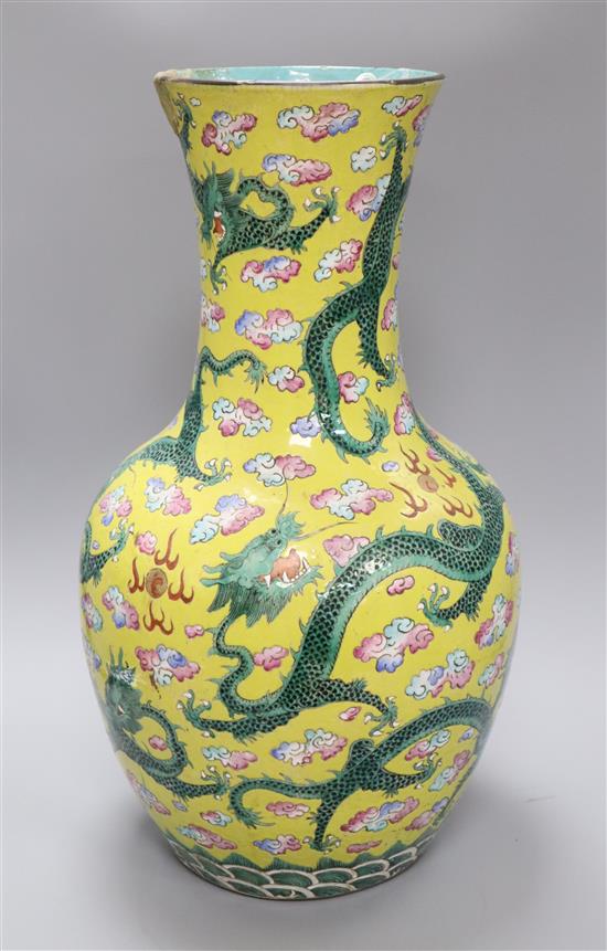 A large Chinese yellow dragon bottle vase, 19th century, damaged height 50cm